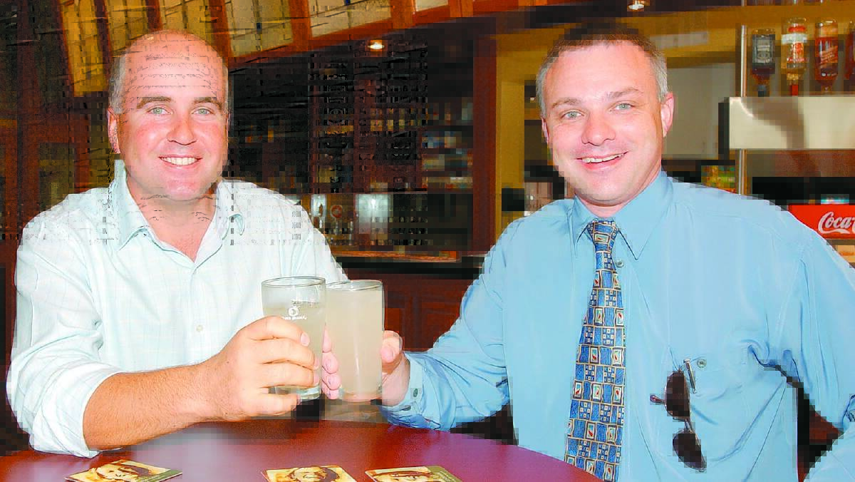 2003: Taking time out from the election campaign trail this week to have a drink together was current Member for Murrumbidgee, the National Party’s Adrian Piccoli (left) and Country Labor Candidate Michael Kidd.