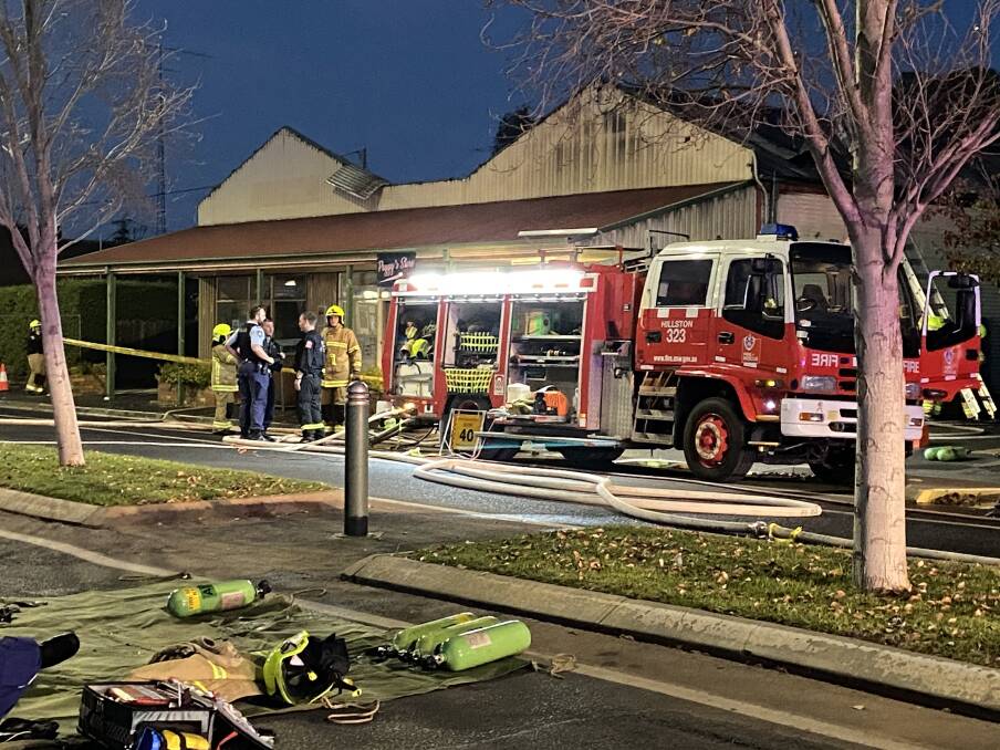ON SCENE: At least 25 firefighters battled a blaze at a Hillston shop on Sunday afternoon. Picture: Fire and Rescue NSW