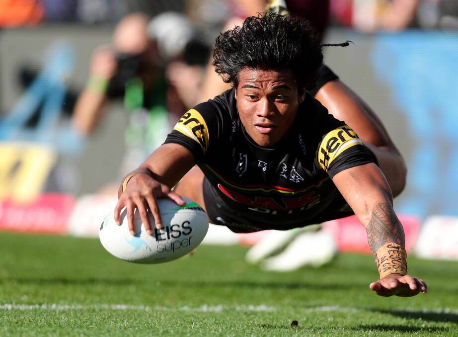 Penrith Panther Brian Tu'uo in full flight. Photo: Phil Blatch, Western Advocate 