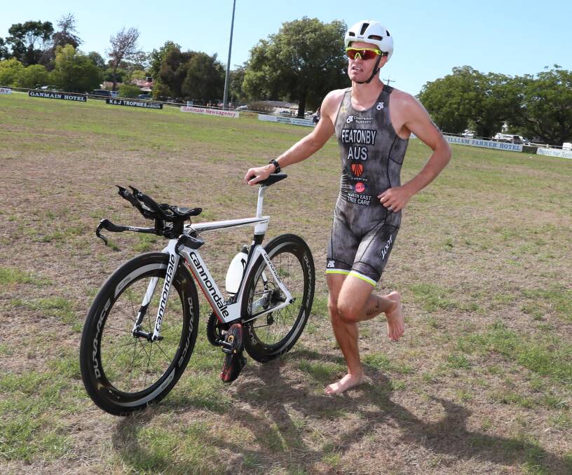 SWIFT RETURN: Albury's Jesse Featonby set a new record as he continues his return to the sport at the Ganmain Triathlon on Sunday. Picture: Les Smith