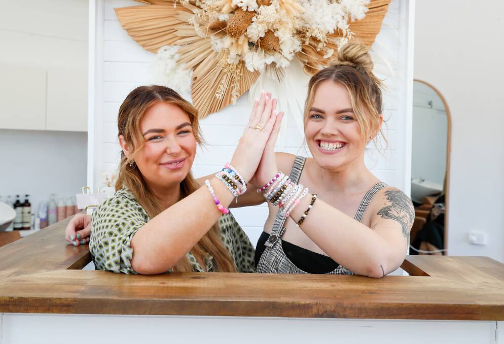 Hairdresser Kyra Rohrich and Wagga Babe Hair Lounge salon owner Adrienne Horne have prepared their friendship bracelets for The Eras Tour. Picture by Les Smith 