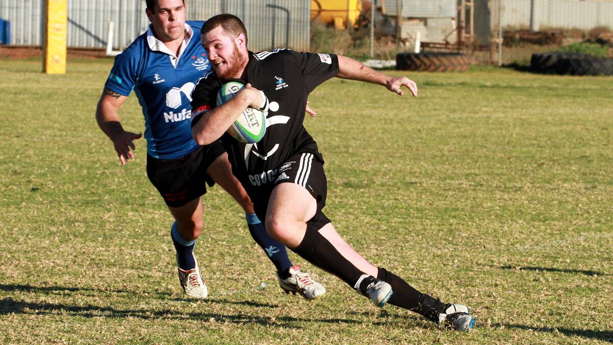 TOP JOB: Jason Waring-Bryant playing for the Griffith Blacks back in 2013. PHOTO: Anthony Stipo