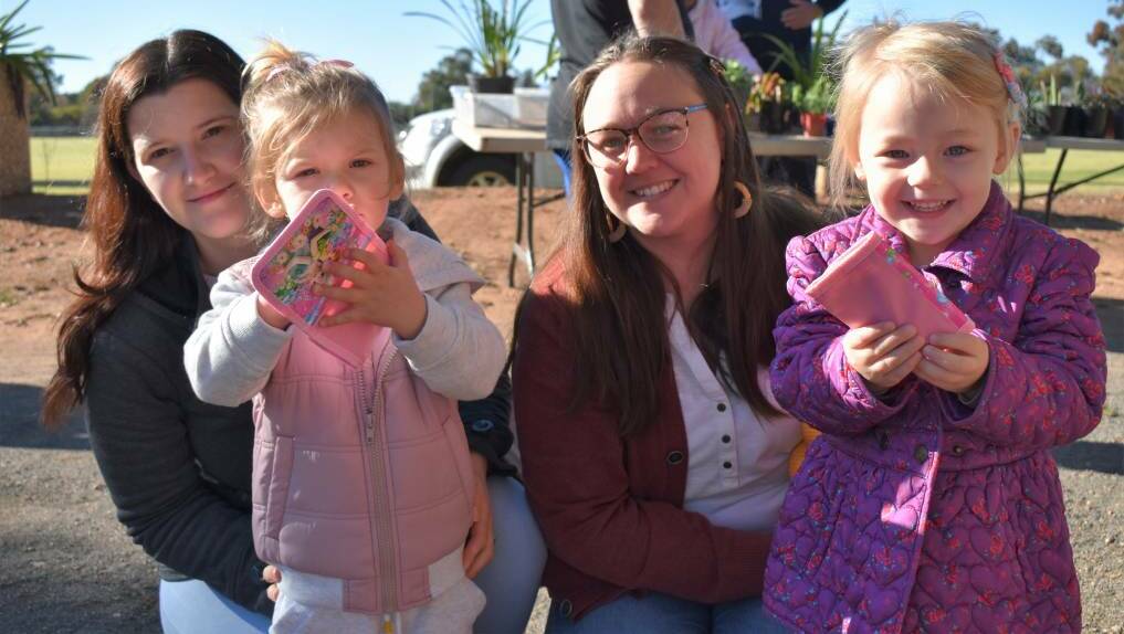 MARKET FUN: Christina and Aria McClean enjoying the Griffith Rotary Markets last year with Robyn and Imogen Wade. Photo: Shaun Paterson