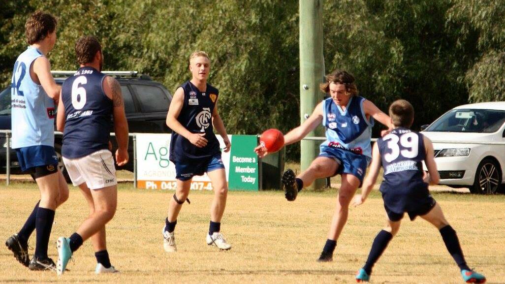 JOINING FORCES: Coleambally and Barellan in competition a couple of seasons ago. The clubs will put their rivalry to one side, at a junior level at least, teaming up to field a joint under 17.5 side this season. 