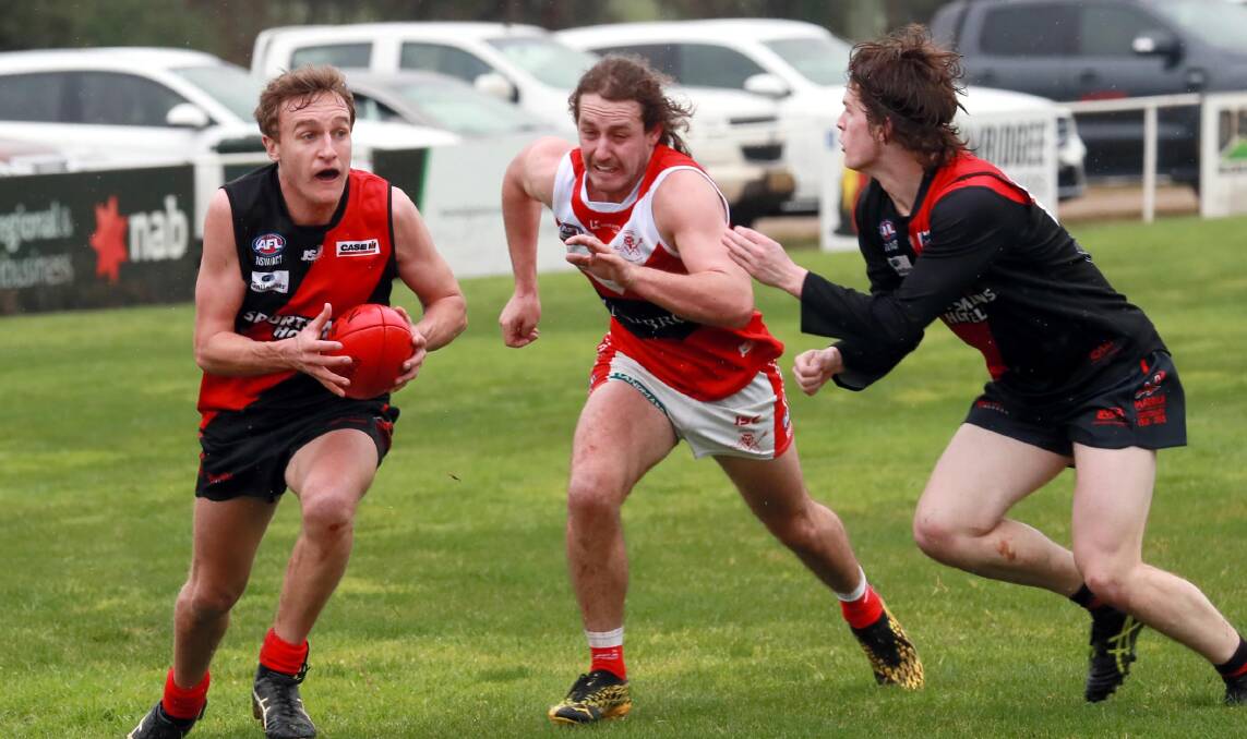 Farrer League club Marrar and the Riverina League's Collingullie-Glenfield Park doing battle in a mid-2020 trial game, with Nick Perryman trying to close in on Jack Reynolds. Picture: Les Smith