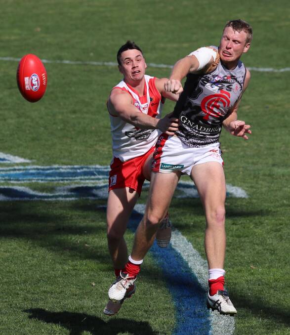 Tom Valeri battles with Collingullie-Glenfield Park big man Ben Klemke in the Swans' 2018 finals. He played four senior games last year, and kicked the match-winning goal in Griffith's reserve grade premiership decider against the Demons. 