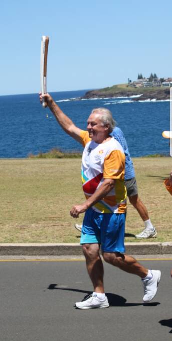 ACHIEVEMENT: Colin Rathbone's hectic 18 months culminated in carrying the Queen's Baton recently.