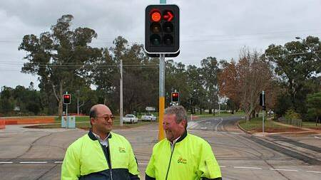 ZEBRA QUERIES: Construction engineer Shree Shrestha and operations manager Dallas Bibby at the opening of the traffic lights on Kookora Street and Willandra Avenue back in 2008.