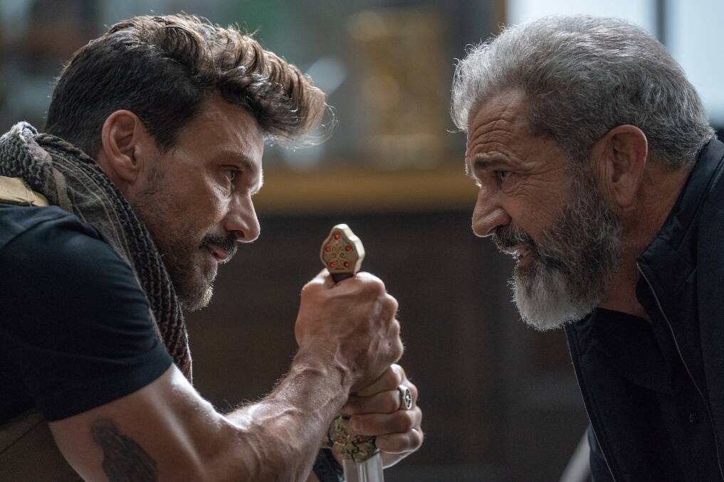 Frank Grillo, left and Mel Gibson in Boss Level. Picture: Icon