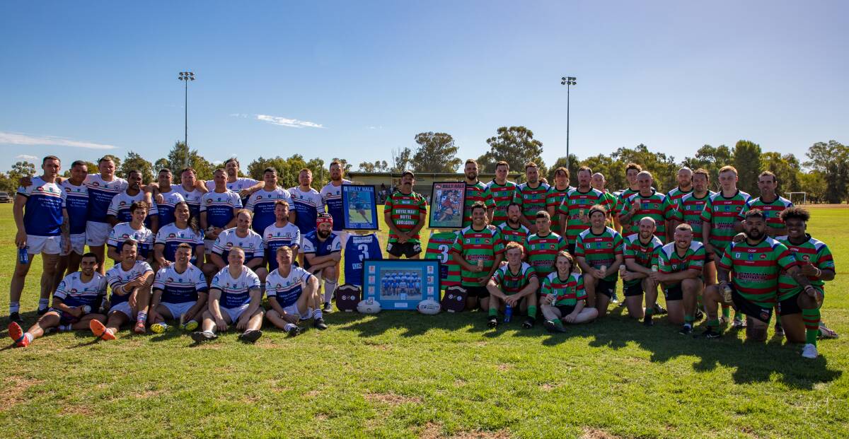 Yenda Blueheelers and Goolgowi Rabbitohs came together to remember a favourite son of both clubs at the end of the memorial game. Picture by Andrew McLean