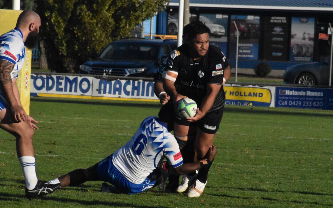 POINTS REQUIRED: Blacks' Chris Latu looks to get the ball away during his side's loss last weekend against City. PHOTO: Liam Warren