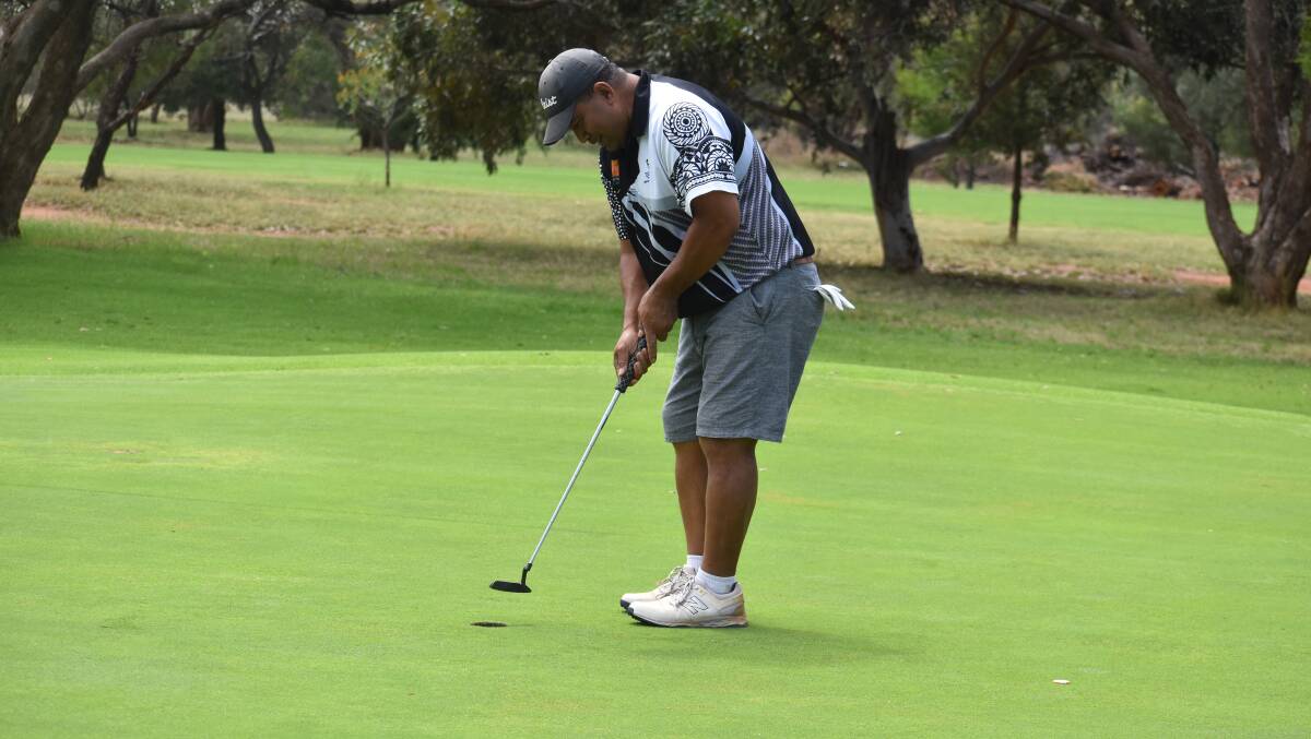 VICTOR: Lama Lolotonga drains a putt. He took out the A grade stableford event on Sunday. PHOTO: Liam Warren