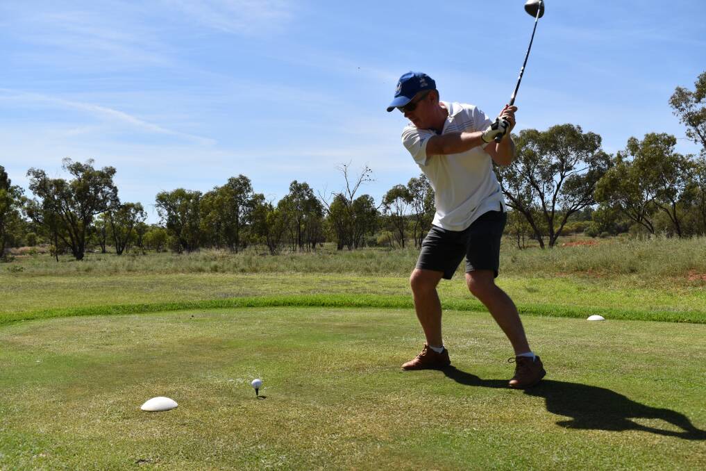 NUMBERS ON THE RISE: Mark Townsend tees off at the Griffith Golf Club. The club has seen an influx of players over the past two months. PHOTO: Shaun Paterson