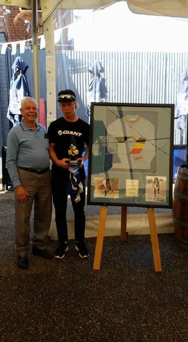 WINNER: Jake Carter presents the Dean Carter Memorial trophy to Cooper Lambden from the Albury Wodonga Cycle Club. PHOTO: Supplied