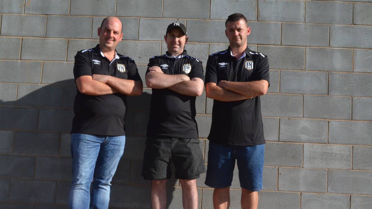 NEW MAN IN CHARGE: New West Griffith coach Rhys Jones (right) with club president Sam Belardo and Dave Del Gigante. PHOTO: Liam Warren
