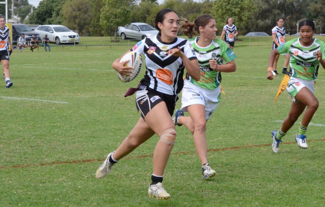 SETTING OFF: Black and Whites' Lily-Belle Misiloi makes a strong break during her side's 18-10 win over Leeton to keep their undefeated streak alive. PHOTO: Liam Warren