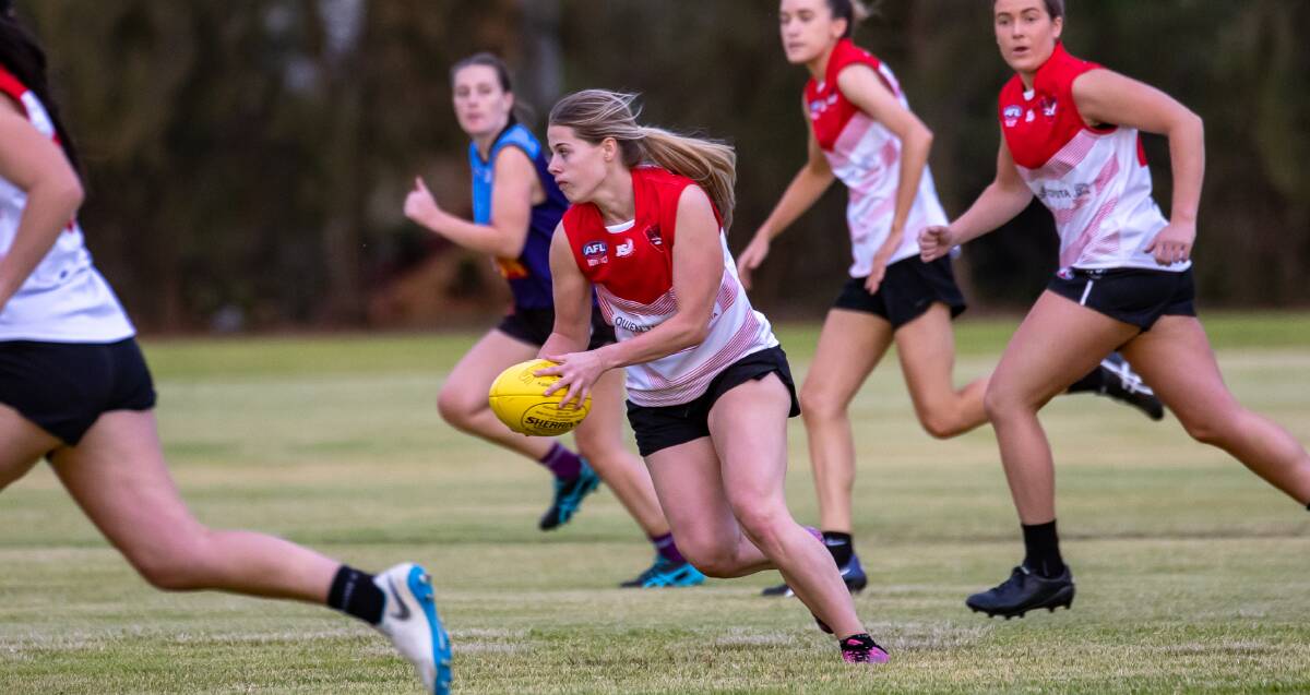 CHARGE: The Griffith Swans AFLW side will head to Wagga looking to continue their good run when they take on CSU. PHOTO: Andrew McLean