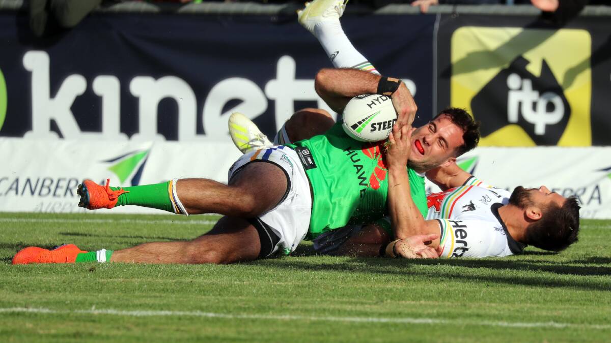 Raiders' Michael Oldfield crosses for a try during their clash with the Panthers last year in Wagga. PHOTO: Les Smith