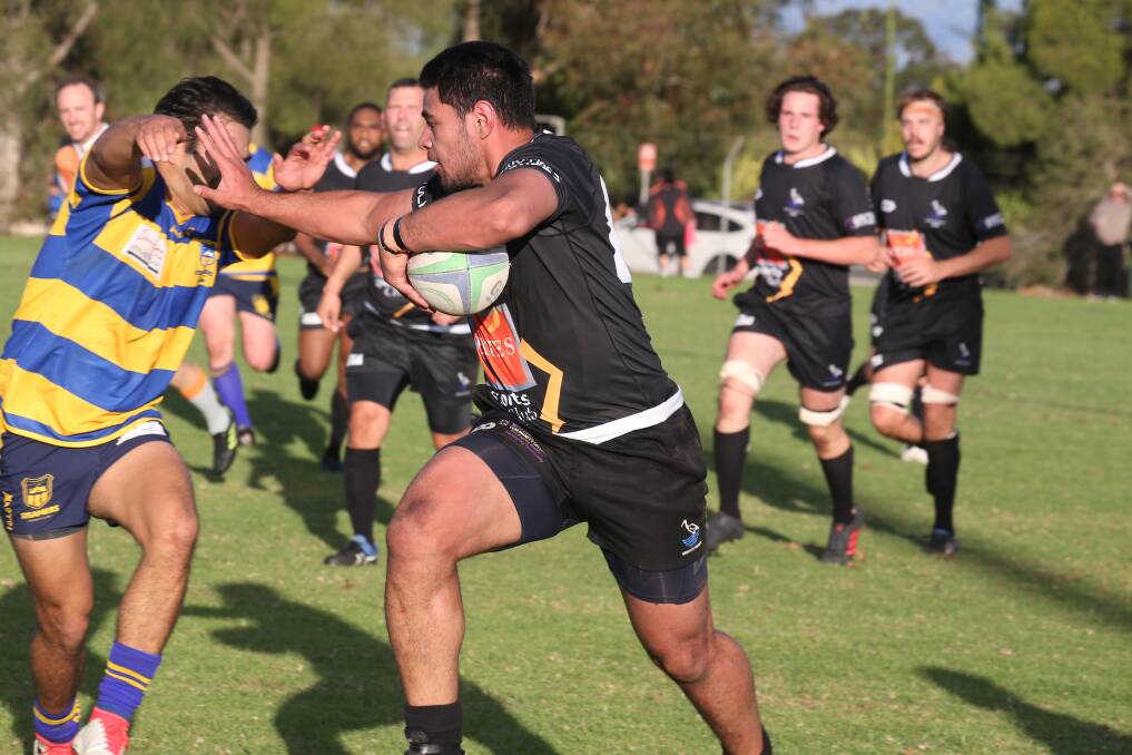 PUSHING THROUGH: Blacks' Johnny Browns tries to get past the Albury defence during the home game two weeks ago. PHOTO: Anthony Stipo