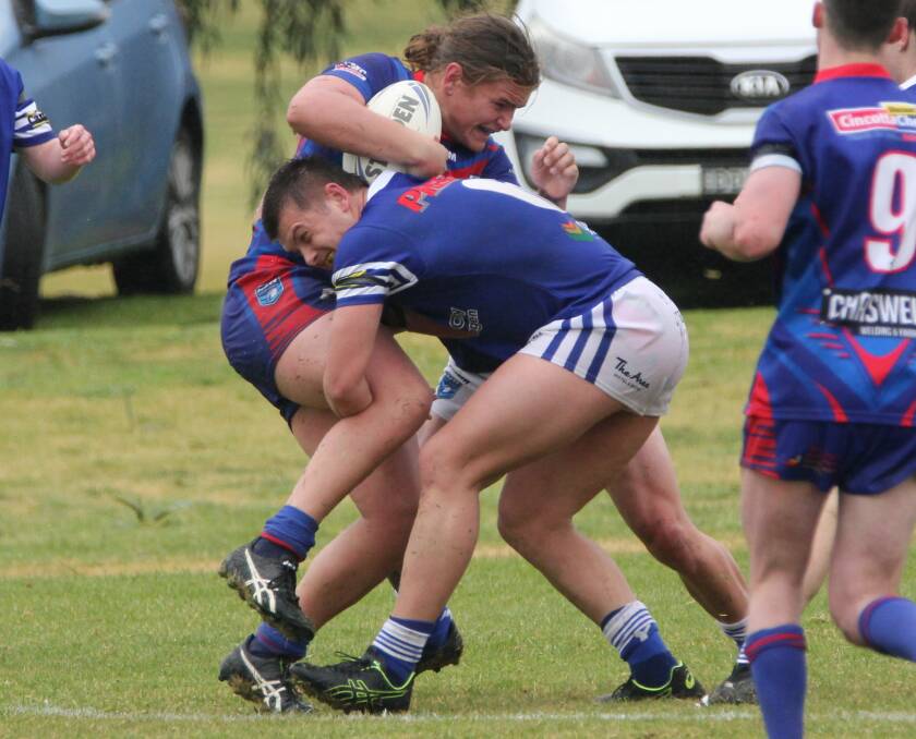 Yenda's Harrison Rudd puts a hit on during the under 18s clash with Kangaroos. PHOTO: Contributed