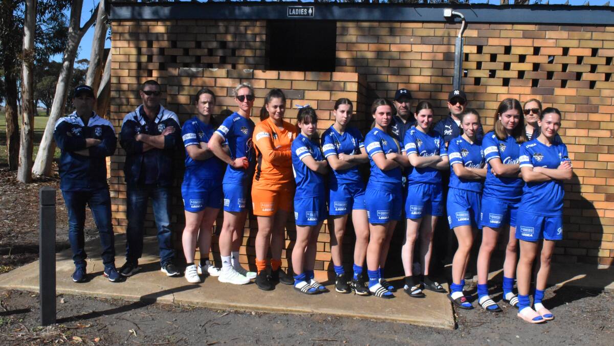 TIME IS NOW: Members of the Hanwood Leonard Cup side outside of the amenities block at Hanwood Oval which offers little for the female players. PHOTO: Liam Warren 