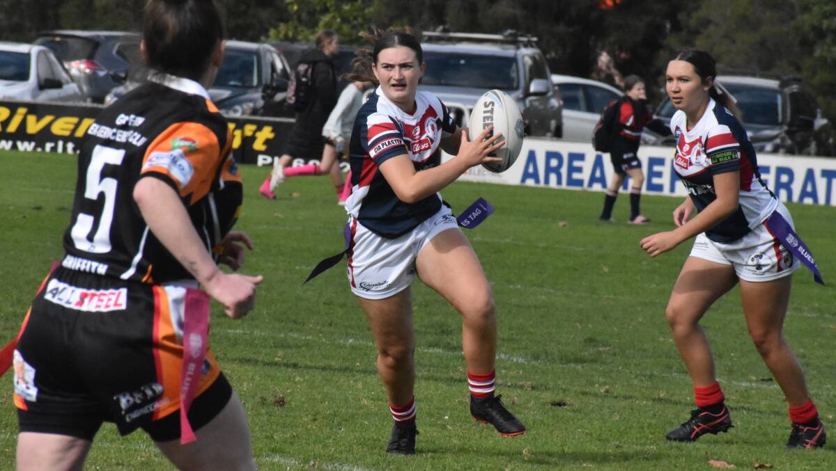 BREAKTHROUGH: DPC's Katelyn Quinn looks to get past the Waratahs defence as the Roosters picked up their first victory of the season. PHOTO: Liam Warren
