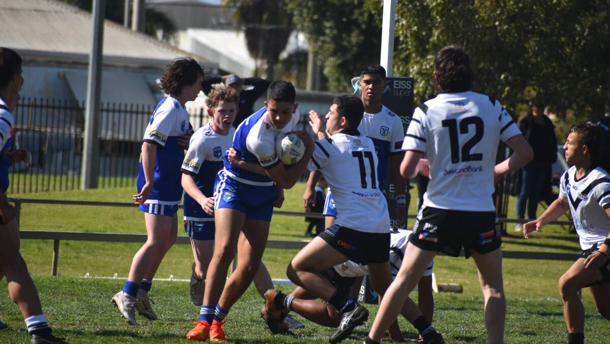 Yenda's Xavier Aston Peihopa-Smith tries to push through the Black and Whites defence during the under 16s preliminary final. Picture by Liam Warren