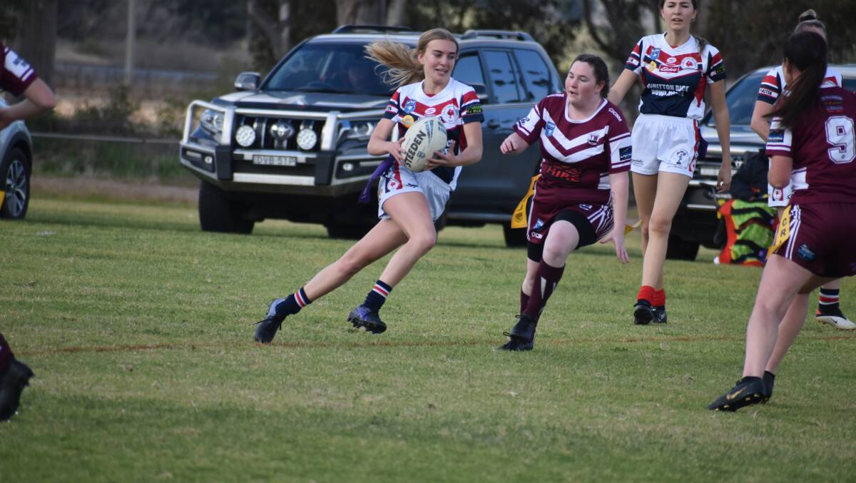 QUICK TURN: DPC's Tamsin Hughes looks to spot a gap in the Yanco-Wamoon defence. PHOTO: Liam Warren