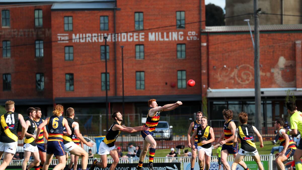 CHANGING TIMES: Wagga Tigers and Leeton-Whitton battle it out during last year's AFL Riverina Championships finals series at Robertson Oval. Picture: Emma Hillier