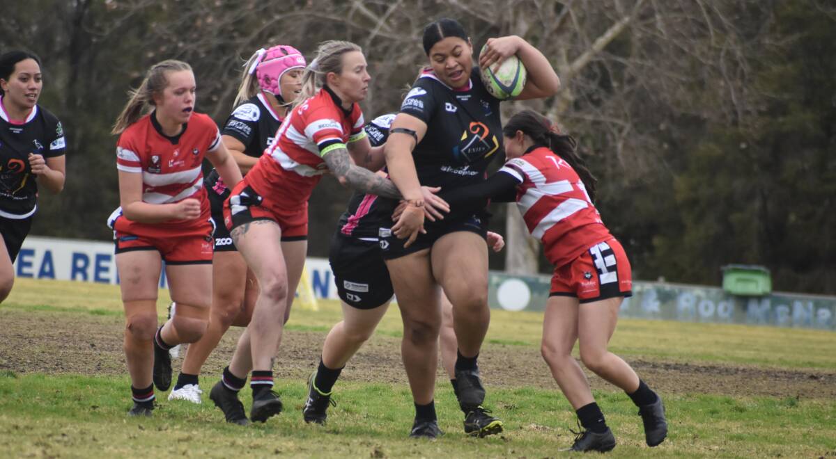 BREAKING THROUGH: Blacks' Angelina Lemoto tries to punch a hole in the CSU defence during the Griffith side's big win. PHOTO: Liam Warren