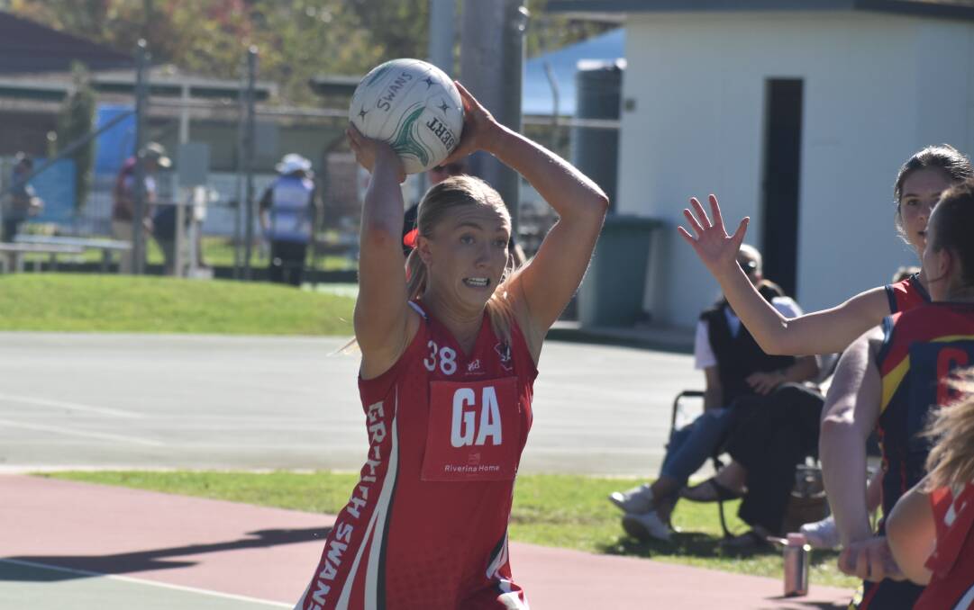 Jenna Richards had a good day in the shooting circle as the Swans powered over their arch rivals Leeton. Picture by Liam Warren