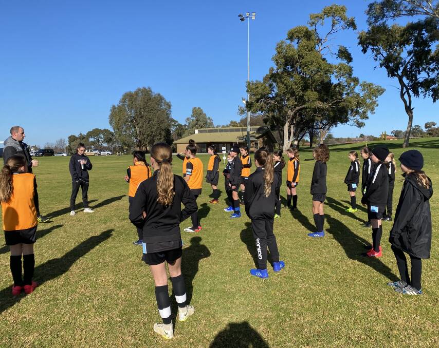 GREAT OPPORTUNITY: Griffith's up-and-coming female footballers had the chance to learn from former Young Matilda Eliza Ammendolia. PHOTO: Contributed