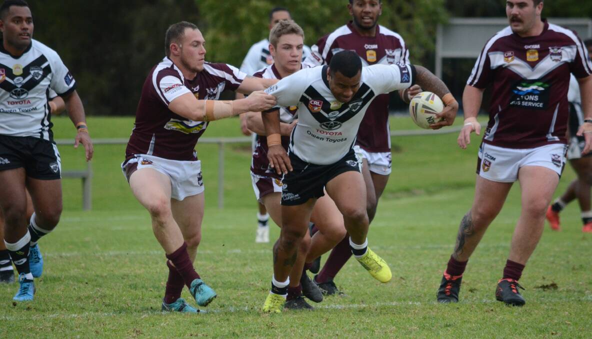 SHOW OF STRENGTH: Black and Whites' Andrew Lavaka looks to get away from the Yanco-Wamoon defence during their last home game. PHOTO: Liam Warren