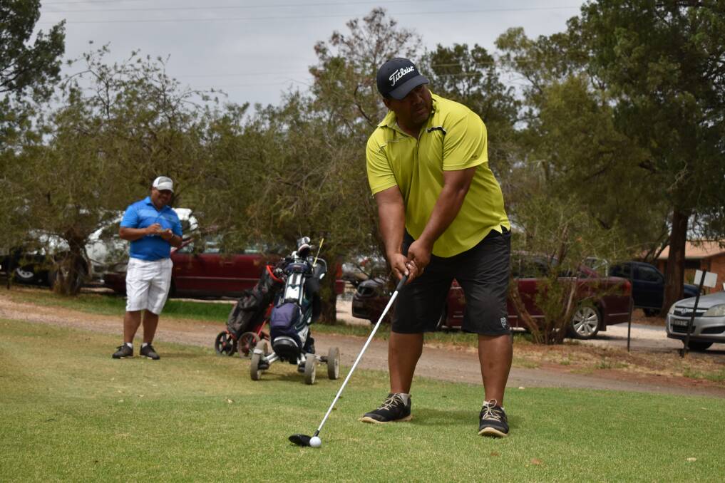 Lama Lolotonga tees off at the Griffith Golf Course on Sunday