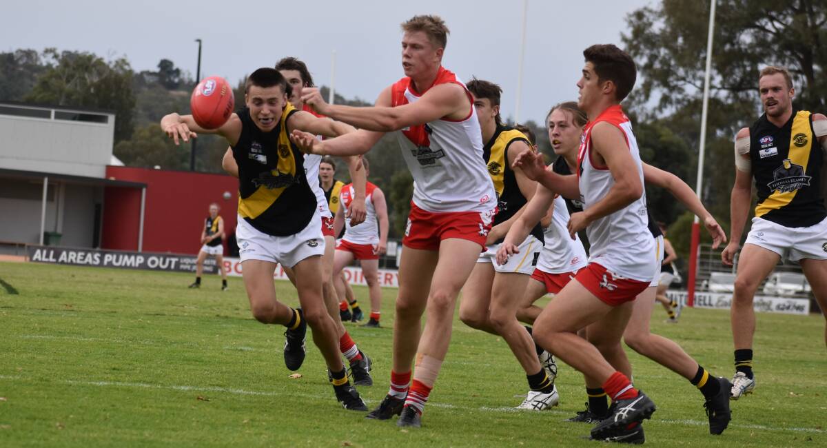 CLOSE CALL: Swans' Riley Irvin, pictured playing against Wagga Tigers, had a good day in defence but it wasn't quite enough as they fell to Coolamon. PHOTO: Liam Warren