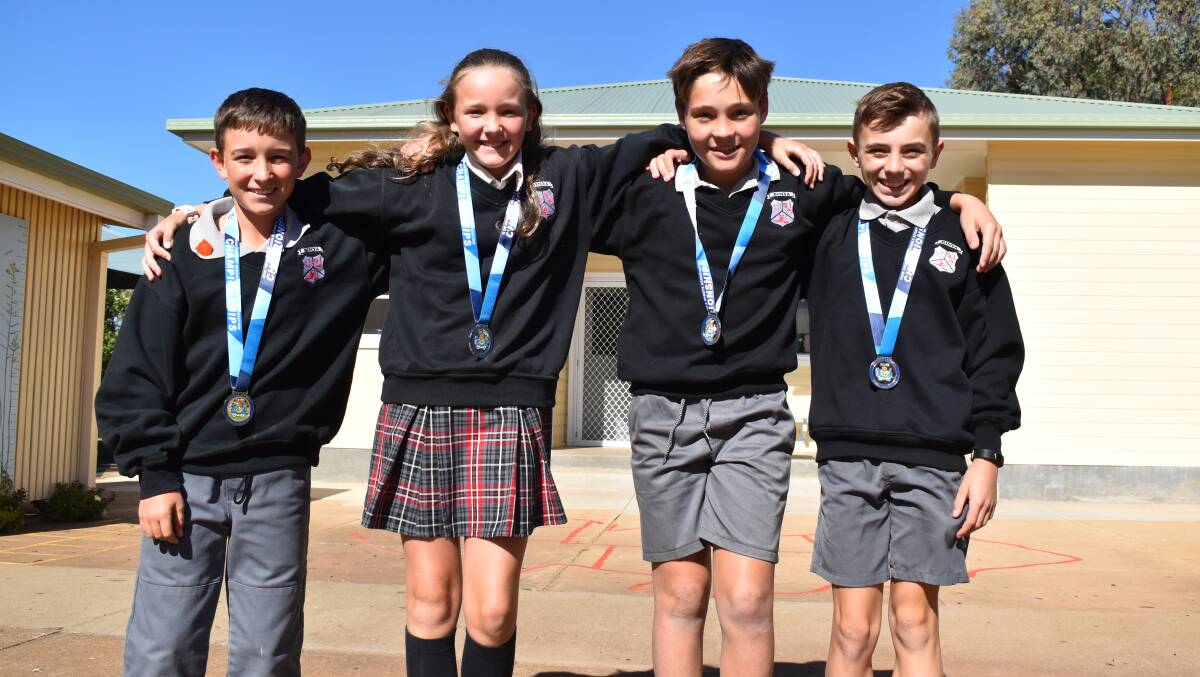 LEGENDS: Max Conlan, Ella Rowney, Tom Curran and Charles Kite broke a 17-year record at the NSW PSSA Swimming Championship. PHOTO: Liam Warren