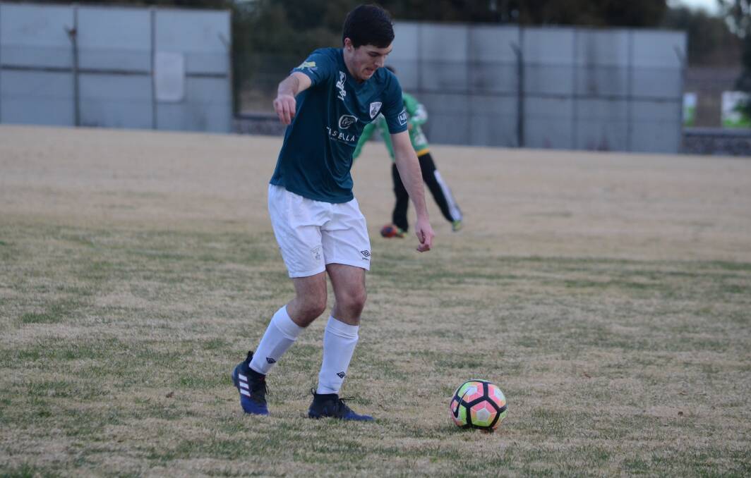 RHINO: Nathan Battocchio playing against Canberra Olympic.