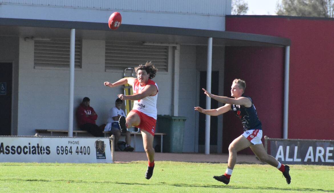 DOWNFIELD: Griffith's Sam Foley looks to cover ground with a long kick out of defence against Collingullie recently. PHOTO: Liam Warren
