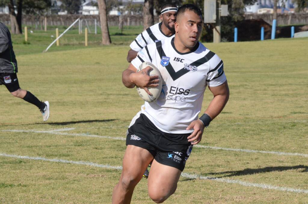 TOUGH PLACE: Uafa Lavaka looks to run the ball up during the Black and Whites clash with Yenda earlier this season. PHOTO: Monty Jacka
