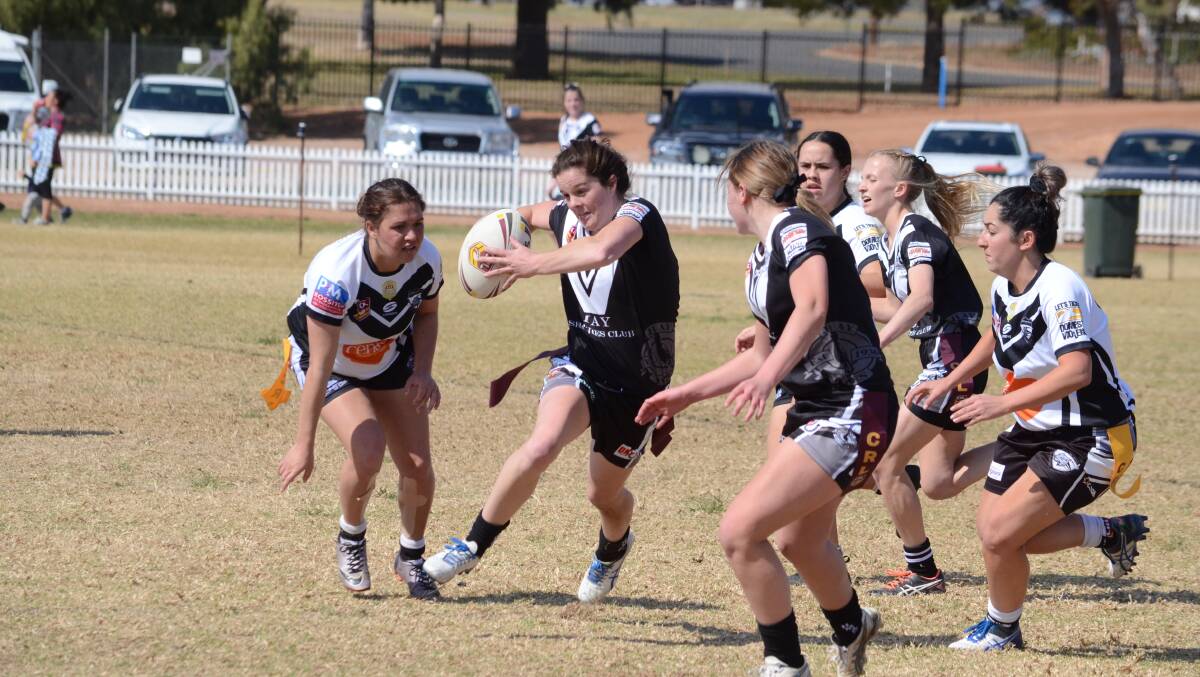 BREEZING PAST: Hay's Rachael Pearson steps her way around the Black and Whites defence during the qualifying final in Lake Cargelligo. Picture: Liam Warren