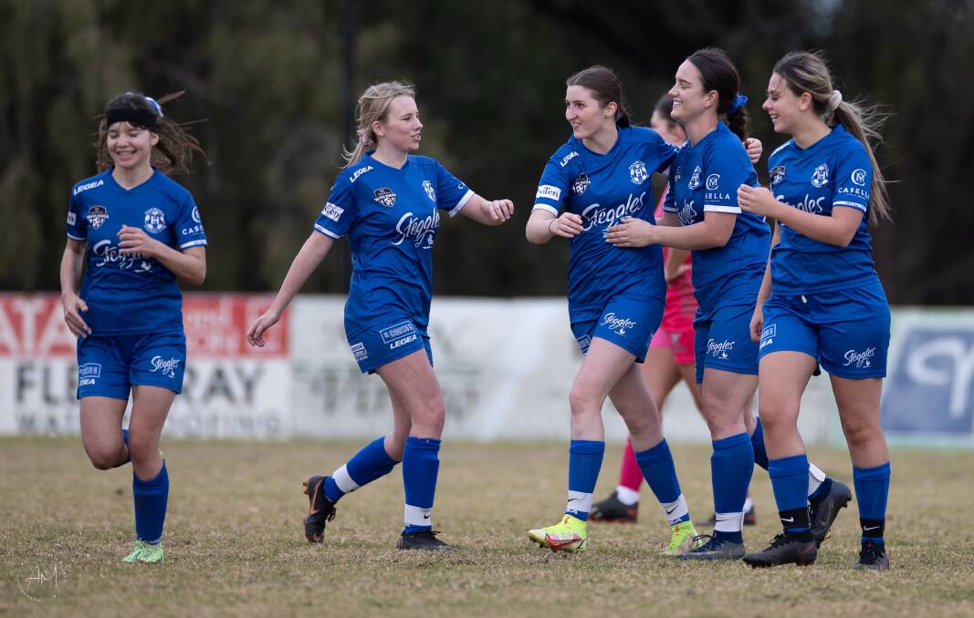 RECORD INTACT: Hanwood celebrate the third goal which turned out to be the match winner from Johane Oberholzer in their tough clash with Junee. PHOTO: Andrew McLean