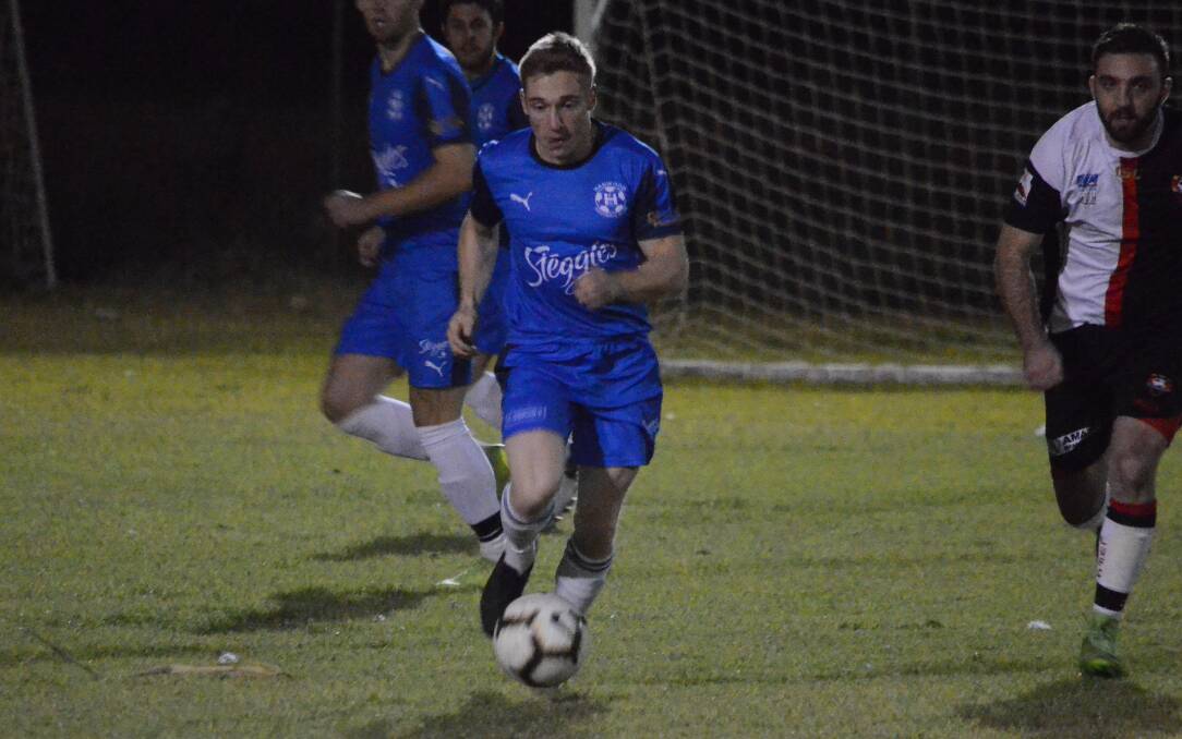 CONTROL: Hanwood's Andrew Gamble looks to bring the ball up the field against Leeton United during their mid-week clash. PHOTO: Liam Warren