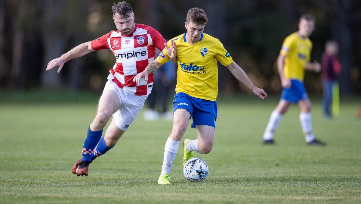 TOUGH ROAD TRIP: Yoogali SC's Calvin Roddie looks to hold off the ball during the difficult clash with O'Connor Knights. PHOTO: Andrew McLean