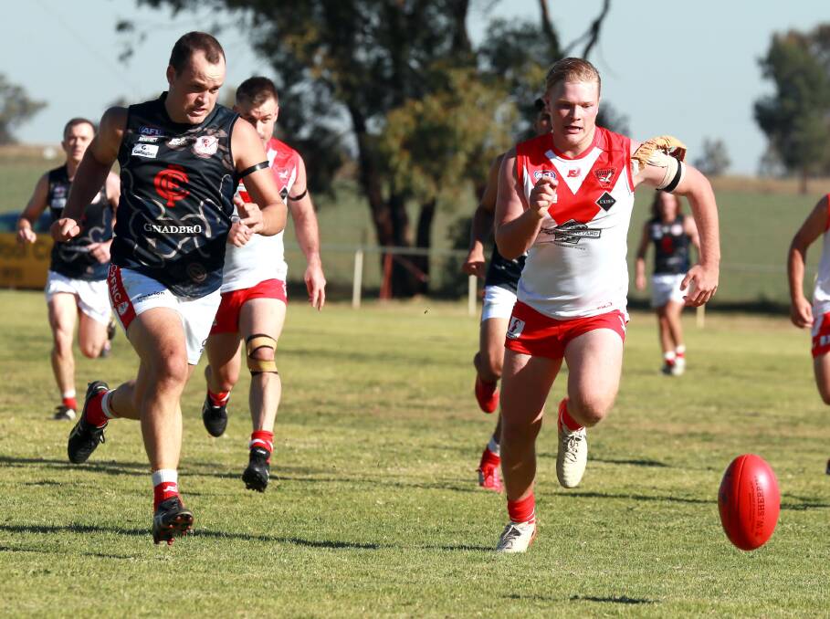 FOOT RACE: Jack Powell looks to chase down the loose ball during the Swans opening round clash with Collingullie. PHOTO: Les Smith