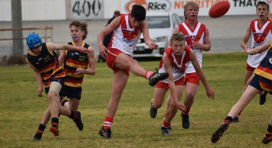 Griffith Red's under 15s' Broden Spencer had a huge day out with four goals against Narrandera.