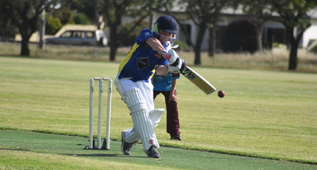 ON THE FRONT FOOT: Exies' Ted Files pulls the ball away to the boundary during their strong start to the fourth grade season. PHOTO: Liam Warren