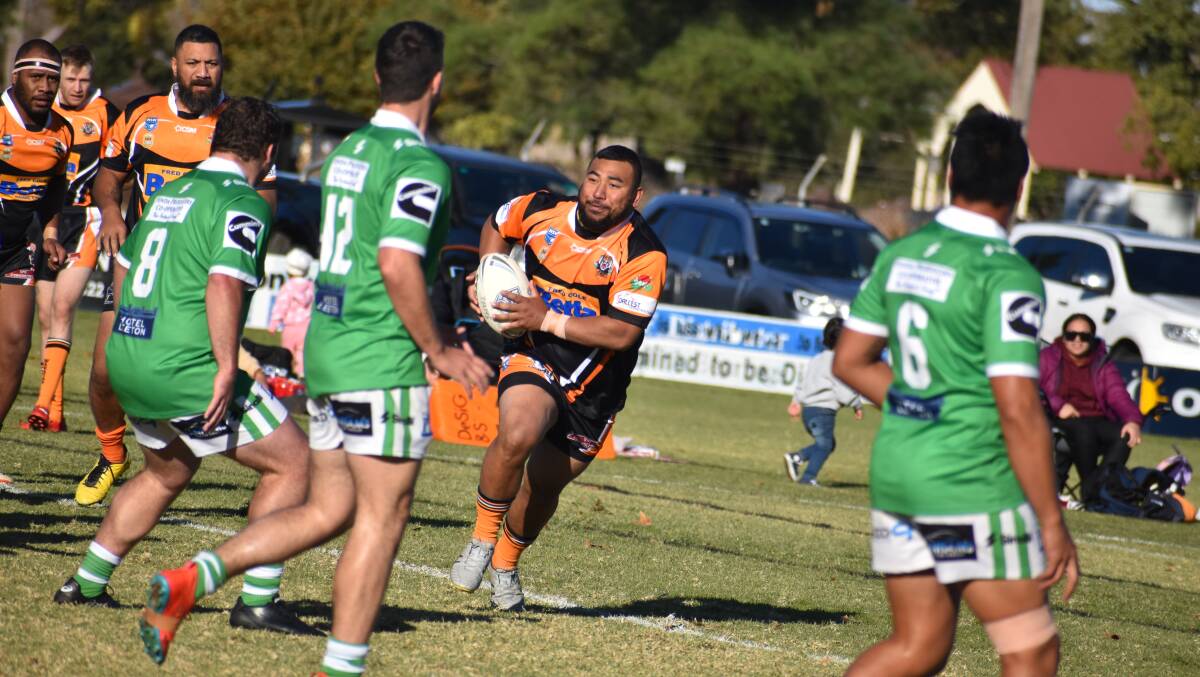 SEARCHING FOR FORM: Waratahs VJ Mataa runs the ball up during his side's tough defeat at the hands of currently ladder leaders Leeton. PHOTO: Liam Warren