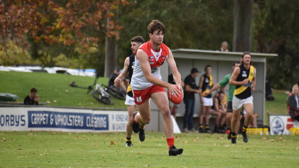 TOUGH DAY: Griffith's Henry Delves kicked one of the five goals for his side.