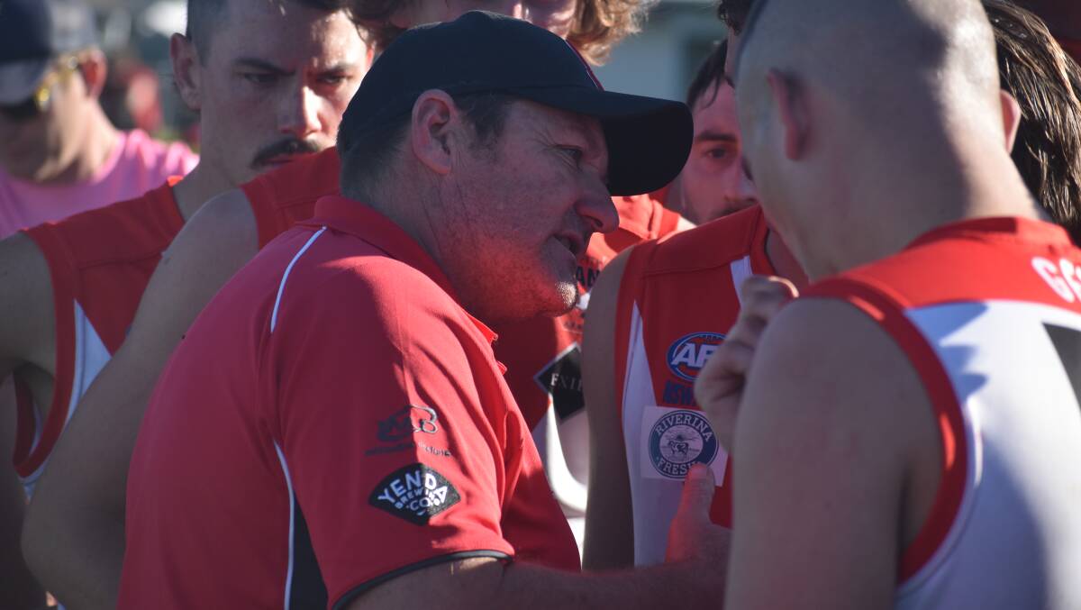 Griffith Swans coach Greg Dreyer read the riot act to his troops at three-quarter-time during the Swans opening round defeat to Mangoplah CUE. Picture by Liam Warren