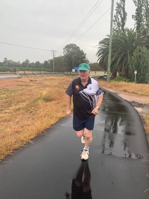 CHANGE OF SCENERY: Warwick Date makes his way around the Feral Joggers wet weather track. PHOTO: Contributed 